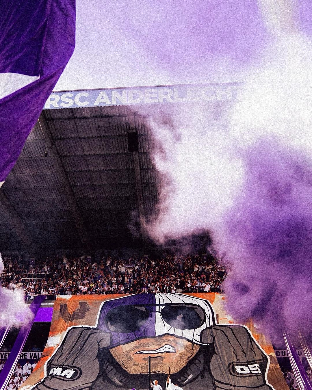 Purple smoke over the stand of RSC Anderlecht, 2024